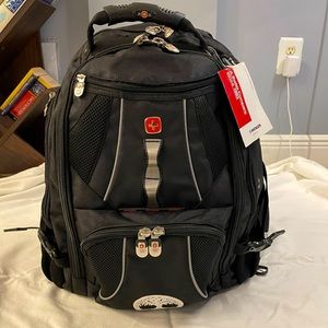 NEW WEGNER BACKPACK; in perfect condition with added silver design in the front!